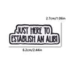 Black embroidered patch with white text that reads JUST HERE TO ESTABLISH AN ALIBI