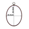 Round wooden embroidery hoop with measurements marked on the frame