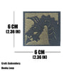 A dark gray embroidered tactical patch featuring a stylized dragon head on a tan background.