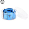 A roll of blue flexible body measuring tape ruler with markings inside a clear plastic container.