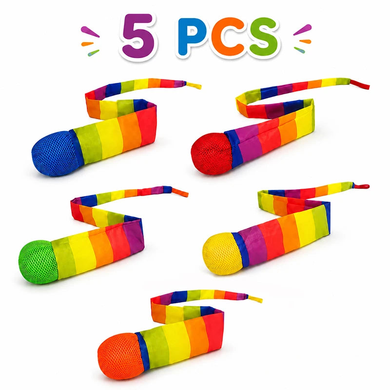 Five rainbow colored comet balls with soft tails displayed on a white background.