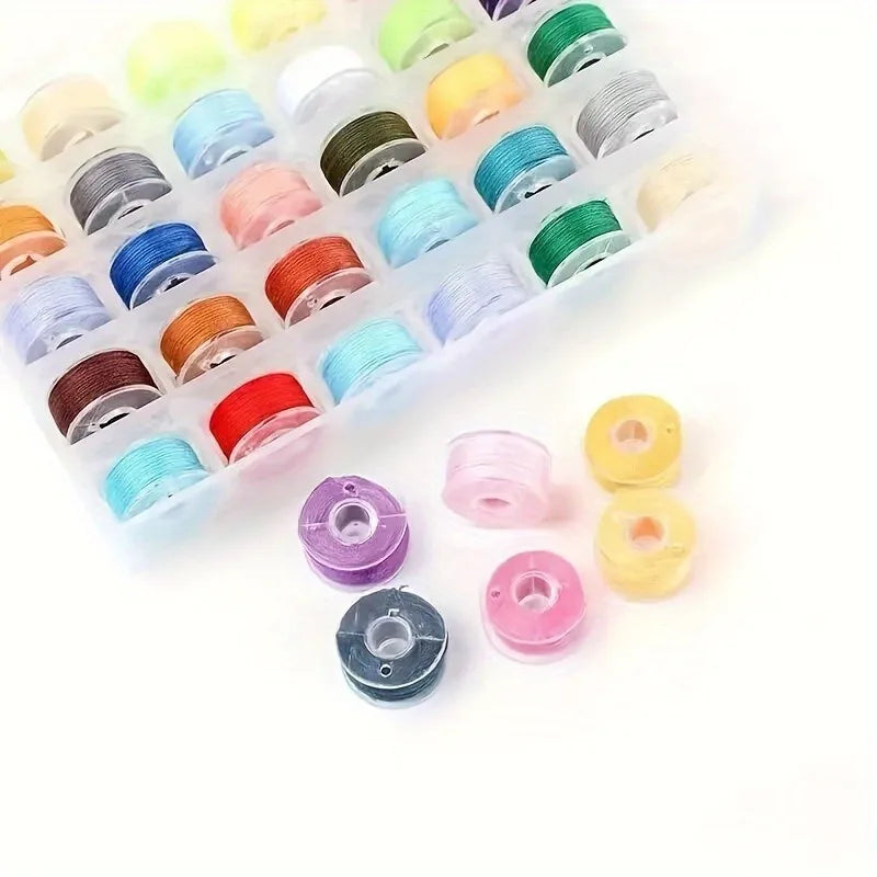 A collection of colorful pre-wound sewing machine bobbins with thread in a clear plastic container.