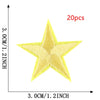 A yellow five-pointed star embroidery patch is shown against a measurement scale.