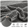 Close-up of a gray jacquard knit sofa cushion cover showing the textured weave and features like comfort, breathability, and 