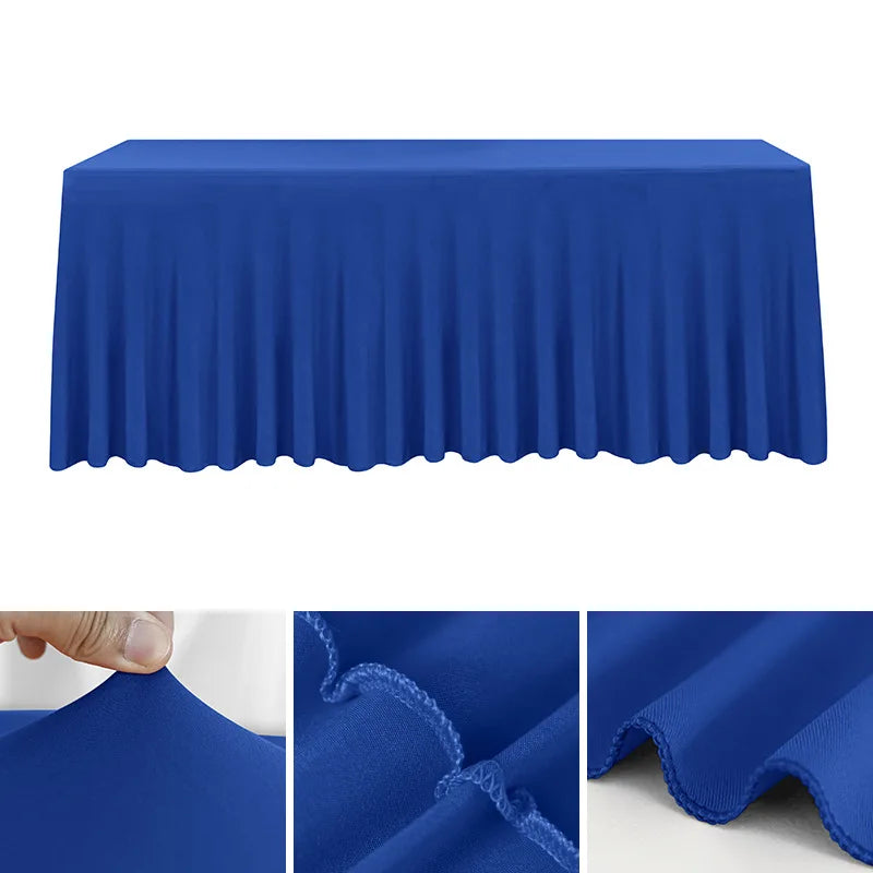 A royal blue stretchable waterproof rectangle tablecloth draped over a table.