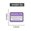 A purple enamel lapel pin shaped like an airline ticket with the text HELLO I'M introverted but willing to discuss cats