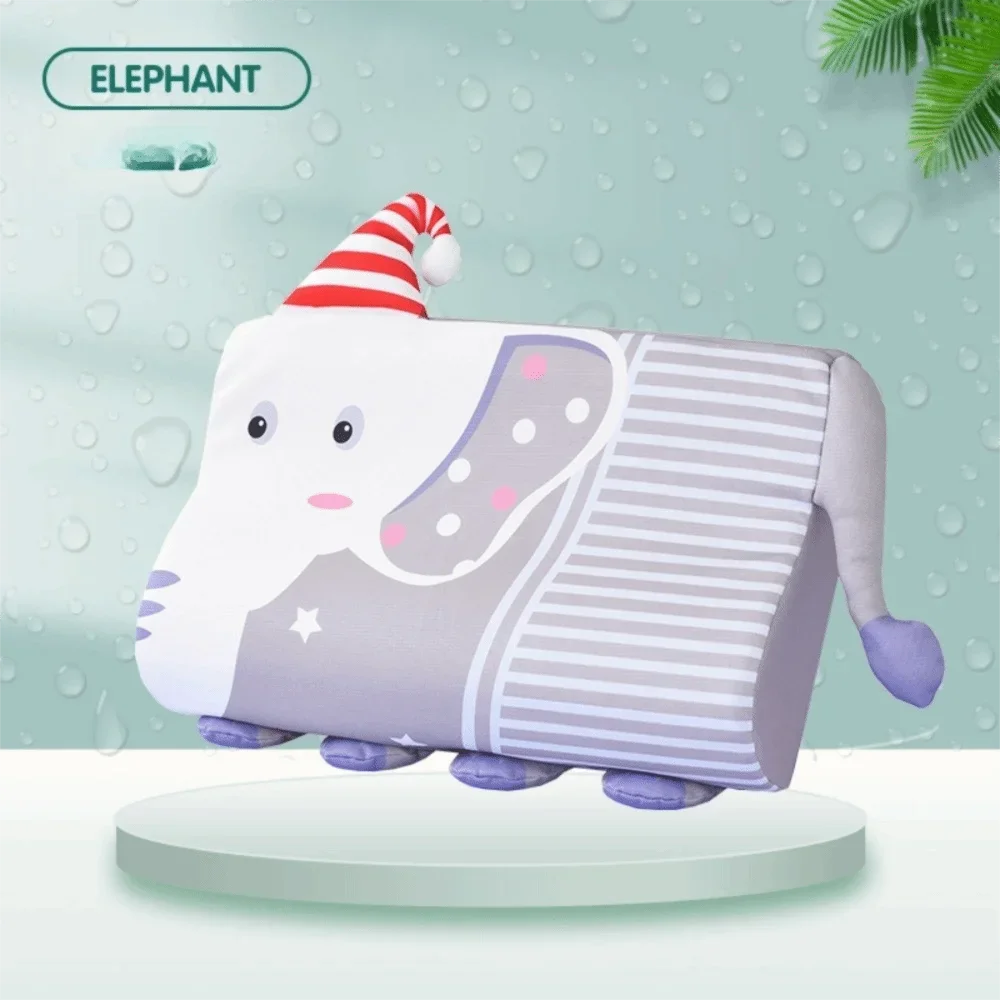 A plush elephant memory foam neck pillow with a striped gray body and a red and white striped conical hat.