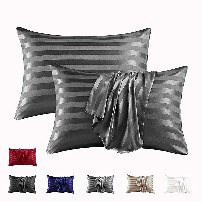 A collection of elegant jacquard striped pillow covers in shades of gray and silver.
