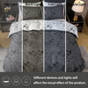 Three versions of a dark gray floral pattern duvet cover and pillowcase shown under dim, warm, and cold lighting.