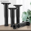 Three black heavy-duty adjustable furniture support legs standing upright on a wooden surface.
