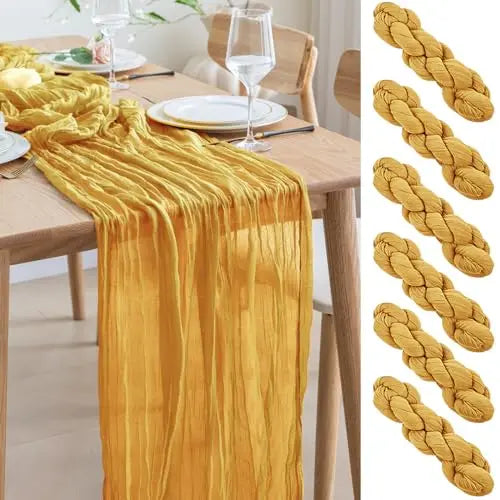 Golden yellow cheesecloth table runner with a braided texture used as home decor or wedding fabric