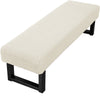 A beige stretch jacquard dining bench cover with a geometric pattern and black frame.