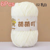 A ball of white soft bulky chenille yarn labeled for crochet and knitting projects.