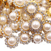 Close-up of gold and pearl rhinestone buttons with crystal accents