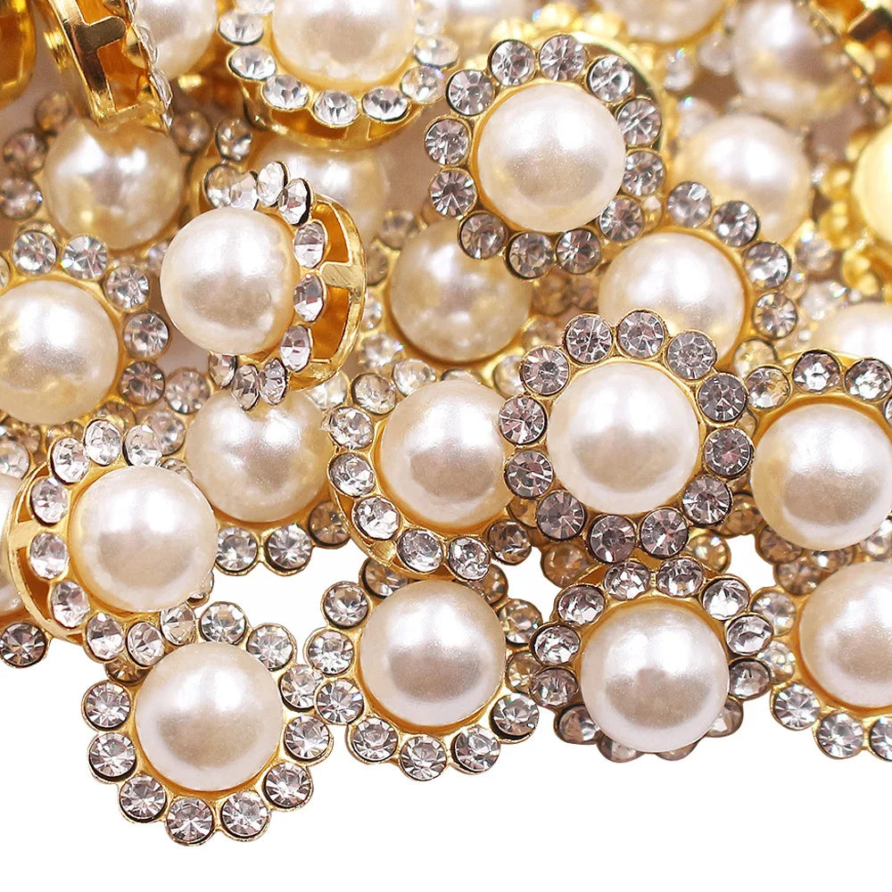 Close-up of gold and pearl rhinestone buttons with crystal accents