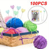 A collection of 100 heart-shaped sewing pins in various colors and shades, including pink, green, yellow, and purple.