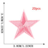 A pink five-pointed star embroidery patch is shown against a measurement scale.