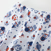 White cotton pajama pants featuring a pattern of cartoon astronauts and space elements for kids