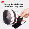 Roll of strong self-adhesive hook and loop tape with a hand demonstrating its use.
