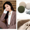 A set of round fabric-covered shank buttons in various shades of olive green and beige for coats and jackets.