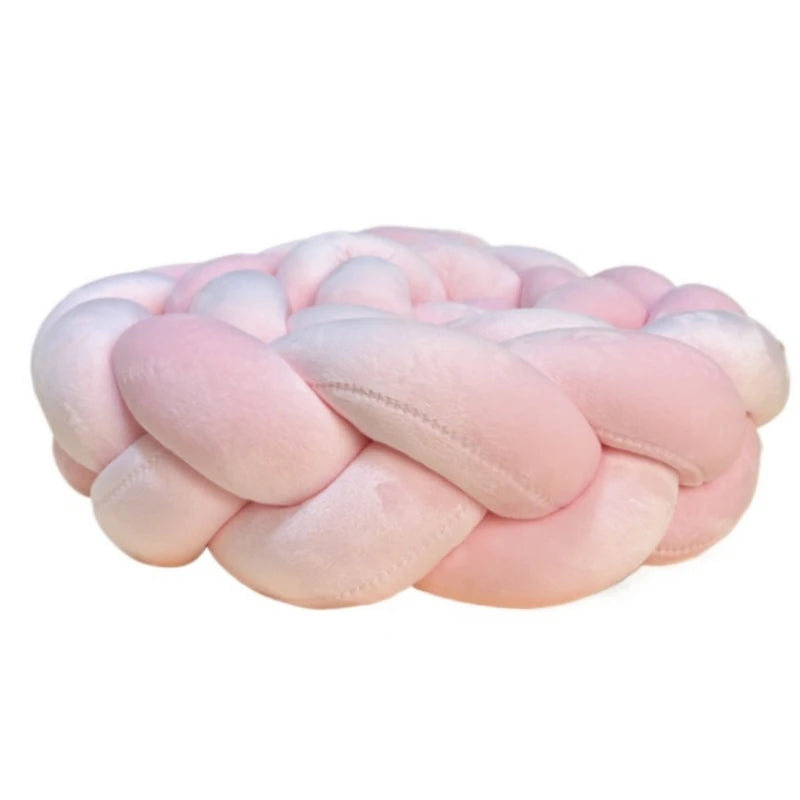 Handmade knotted floor mat for bed decor made of pink fluffy material