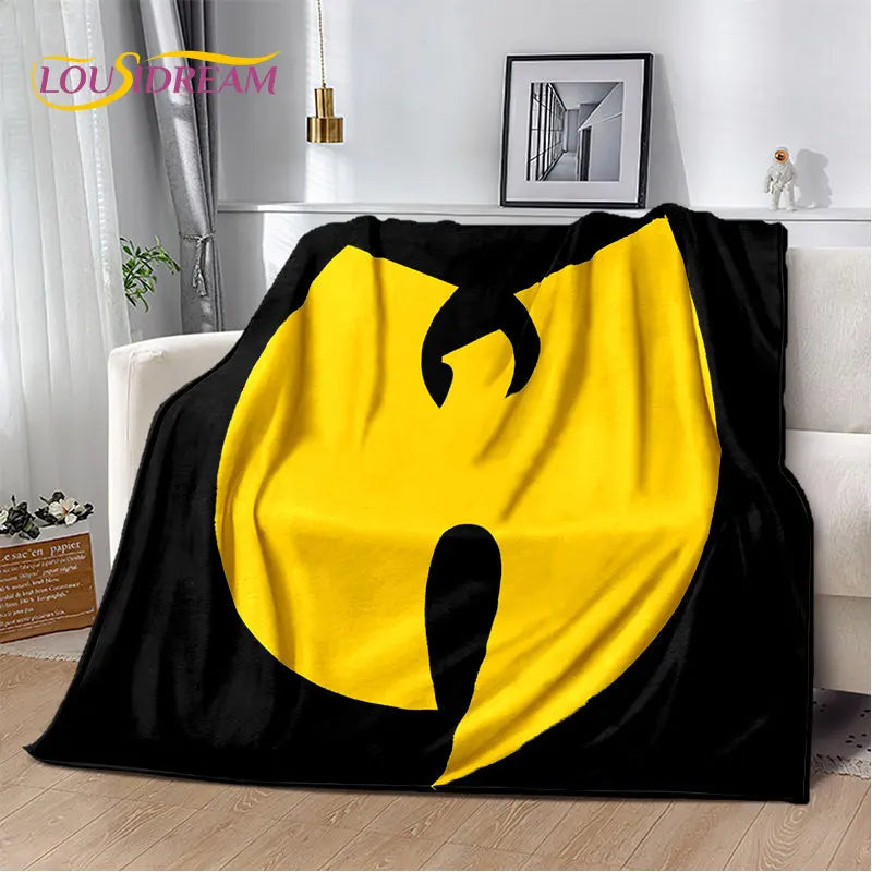 A black and yellow flannel throw blanket featuring a large, playful cat silhouette design.