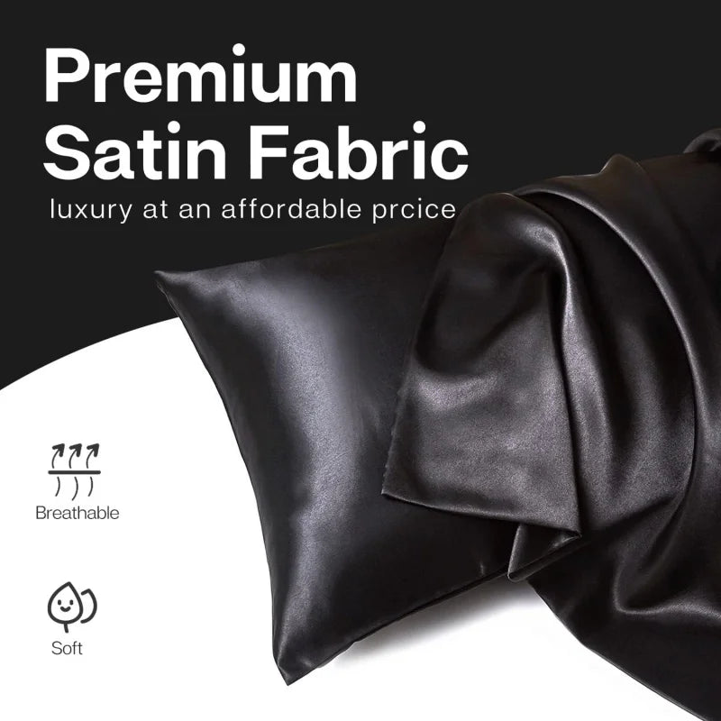 A close-up of a black satin fabric pillowcase showing its smooth texture and breathable, soft finish.
