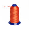 A spool of bright orange embroidery thread labeled Col. 1907