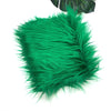 Bright green faux fur plush fabric used for sewing and crafting