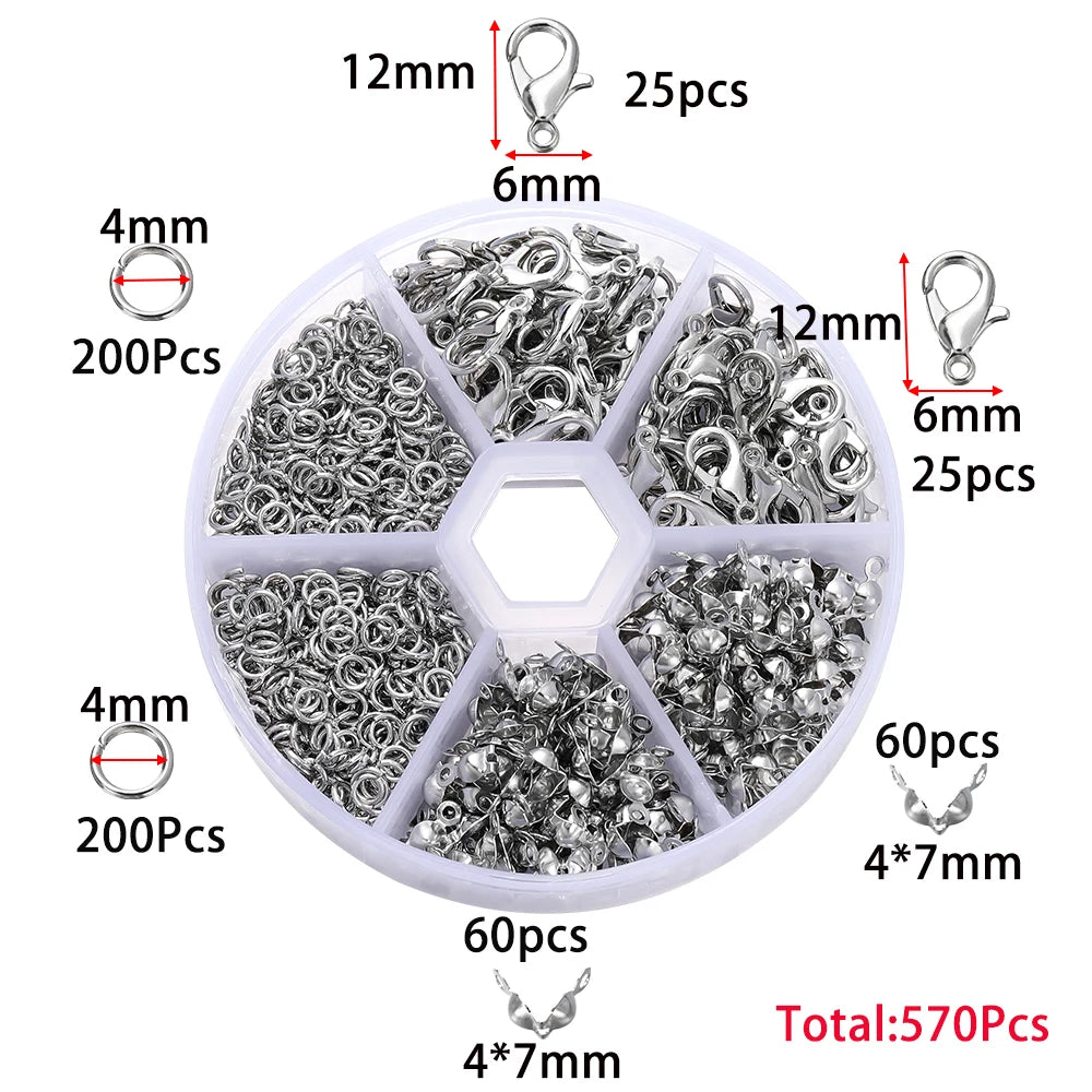 A circular plastic tray containing various silver-colored lobster clasp findings and jump rings for jewelry making.