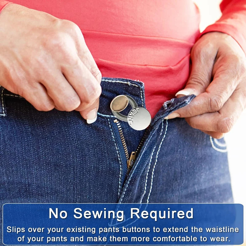 Hands are shown extending the waistline of denim pants using a metal button extender.