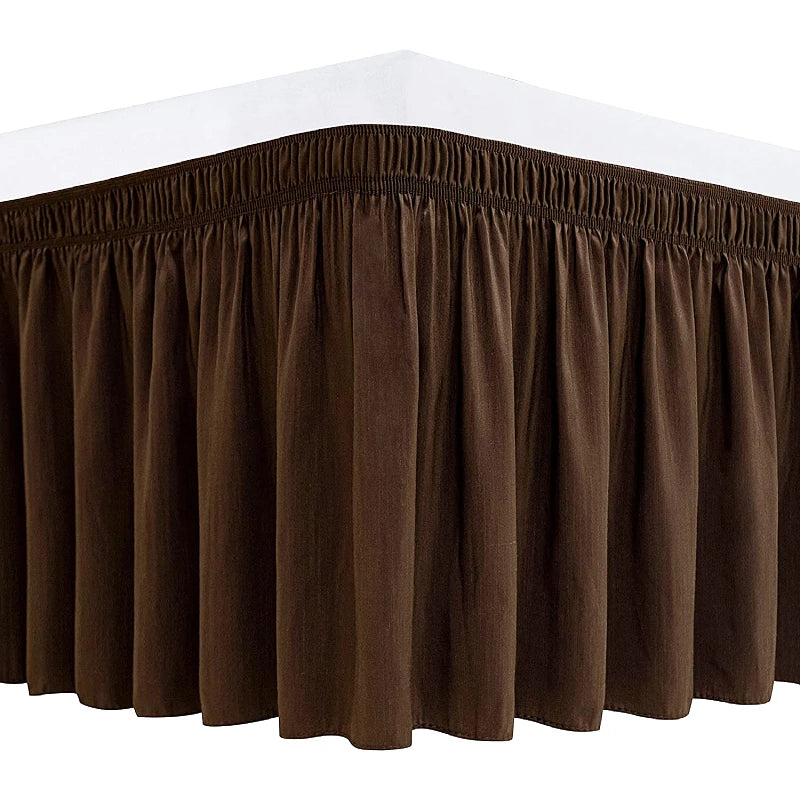 A dark brown thick ruffle bed skirt with an adjustable elastic belt.