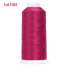 A spool of magenta embroidery thread labeled Col.1984 with a white core.