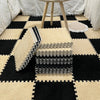 A black and beige checkered play mat featuring soft plush EVA foam tiles for kids.