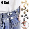 A set of four metal button snaps used for clothing and DIY projects shown on a denim fabric.