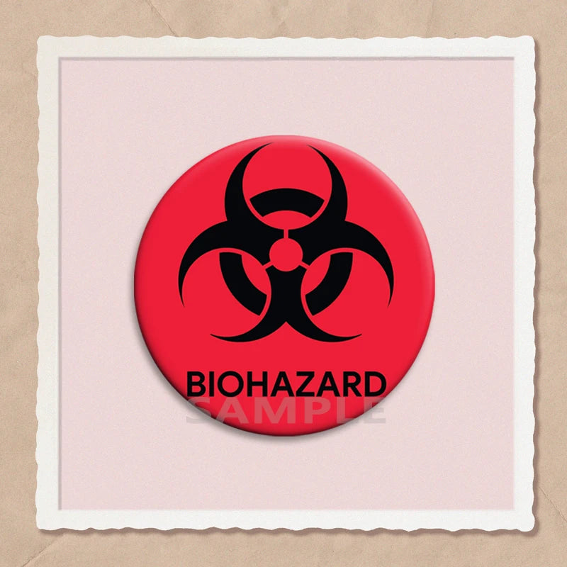 A red circular pin featuring a black biohazard symbol on a light pink background.