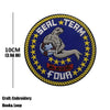 Embroidered patch featuring a bear silhouette and text Seal Team Four on a dark blue background