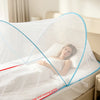 A white mosquito net is shown covering a bed, demonstrating increased surround space.