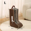 A brown waterproof foldable boots storage bag displayed on a round mat.
