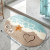 A beige and blue rug featuring a starfish and heart design for a bathroom.