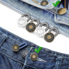 A close-up of a metal button extender for jeans showing various sizes and a green checkmark.