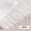 Close-up of white thread curtain tie-back material showing fine fibers and texture.