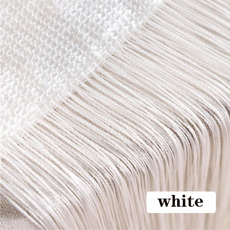Close-up of white thread curtain tie-back material showing fine fibers and texture.