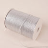A roll of 10-meter gold and silver glitter satin ribbon with a white core and thin string attached.