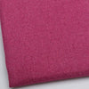 Close-up of a deep magenta coarse linen and cotton fabric texture.