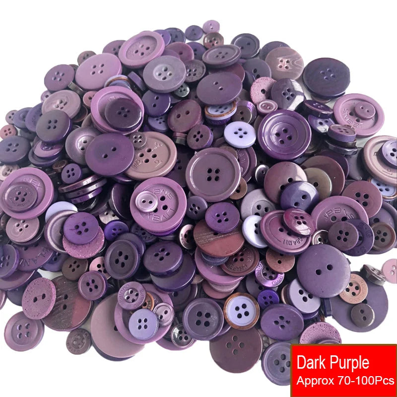 A pile of assorted dark purple resin sewing buttons for crafting and DIY projects.