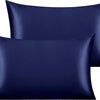 A set of two navy blue silky satin toddler pillowcases.
