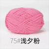 Pink organic cotton 4ply knitting yarn skein rolled into a ball