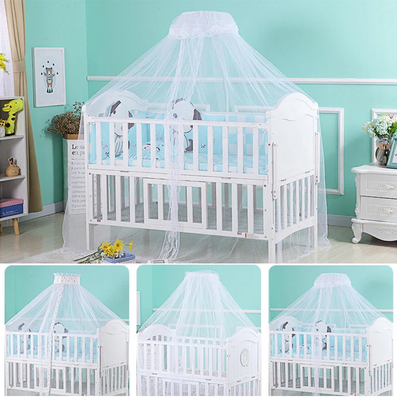 White foldable mosquito net canopy covering an infant cot with a decorative design.