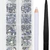 A clear plastic container holds various sizes of silver and iridescent rhinestones with an applicator tool.